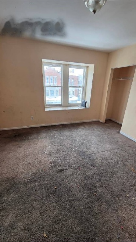 Rowhome bedroom cleared and empty after cleanout